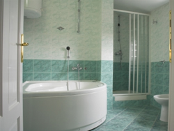 One of our Bury St Edmunds bathrooms Suffolk: traditional bathroom with corner bath and large shower cubicle